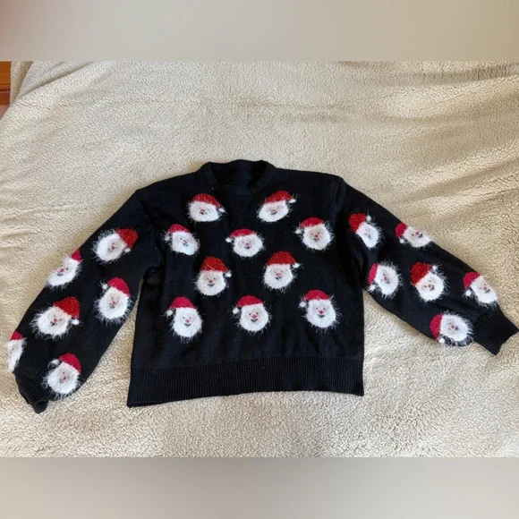 Brand new, never worn, Festive Black Sweater with Santa Faces from Krush Kandy - Picture 1 of 2